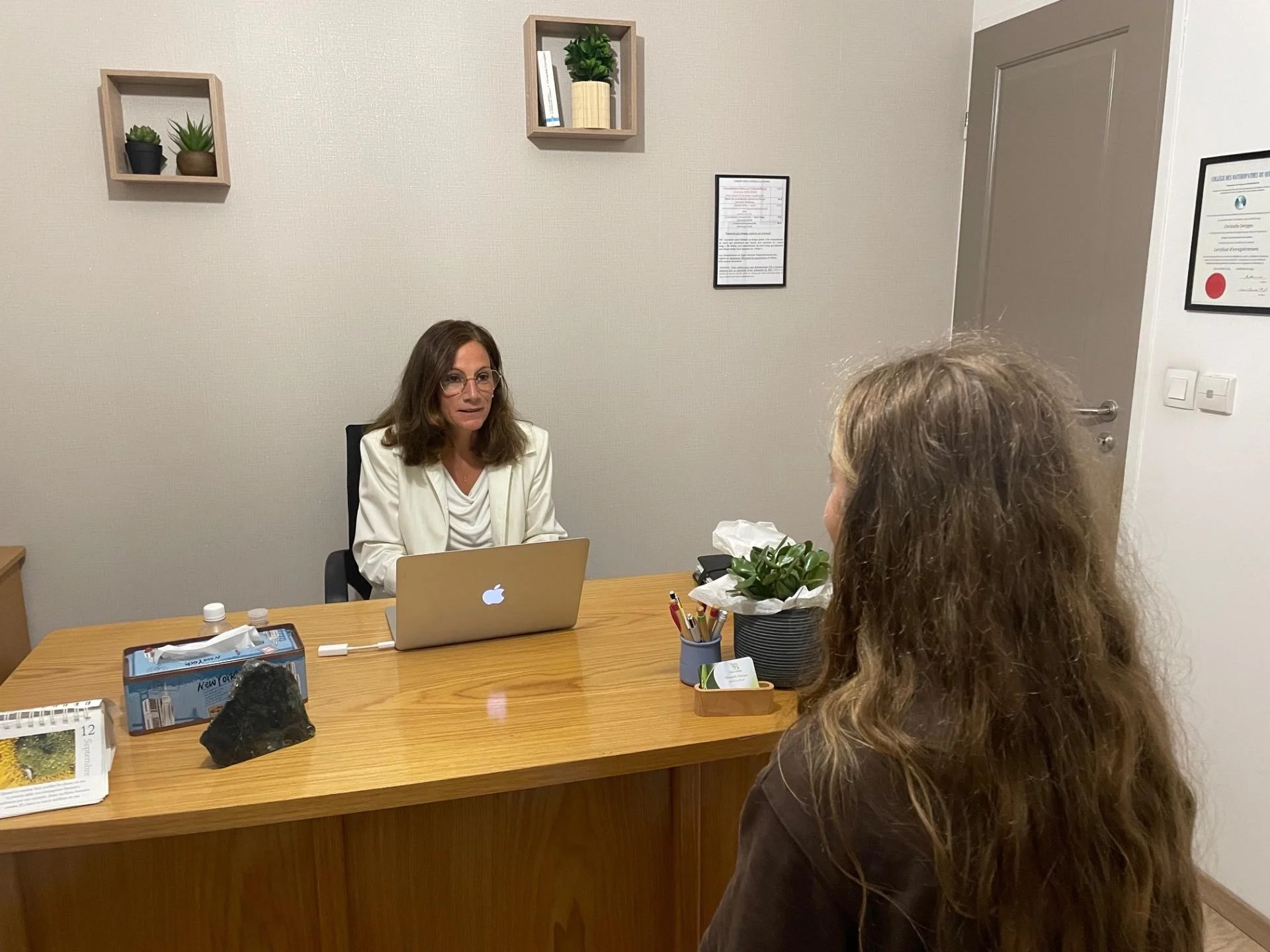 Consultation avec patiente au cabinet